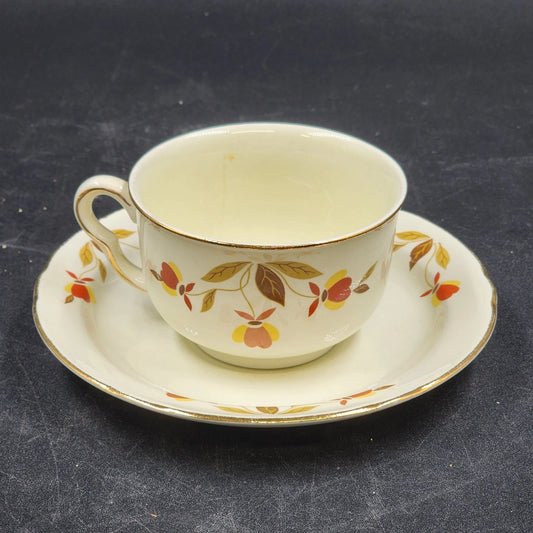 Hall China Autumn Leaf ruffled D flat cup and saucer set