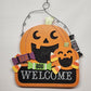 Orange and black pumpkin shaped Halloween welcome sign with glitter candy accents