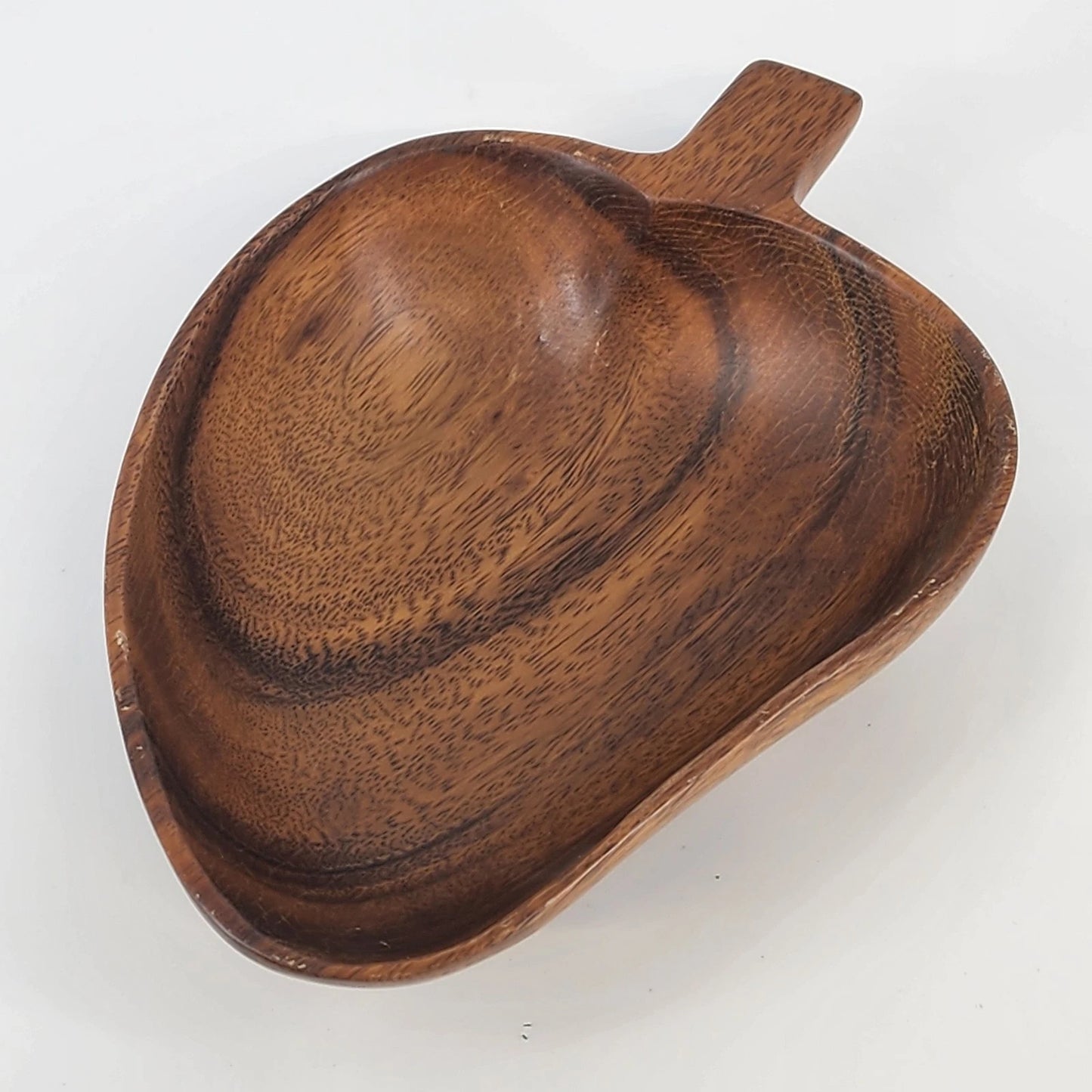 Hand carved monkey pod wood bowl in spade shape made in the Philippines