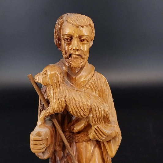 Vintage hand carved wooden nativity shepherd figurine carrying lamb