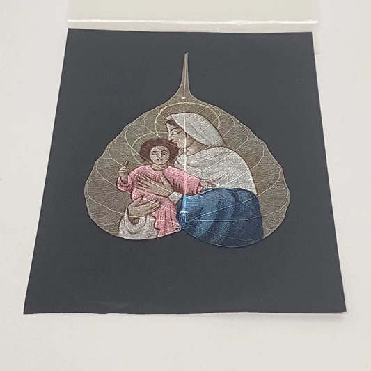 Hand painted Madonna and Child artwork on a genuine Peepal skeleton leaf