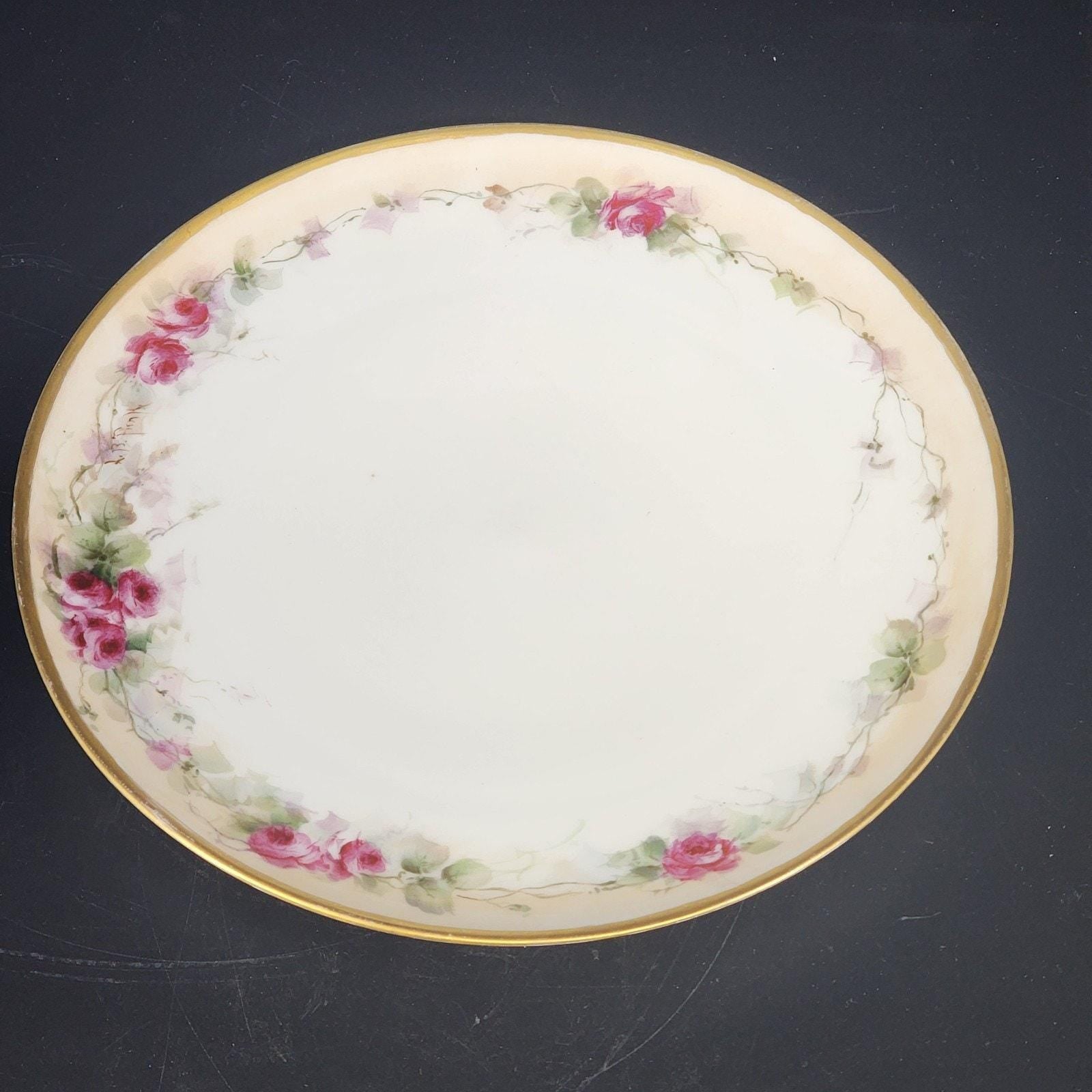 Antique Haviland Limoges France porcelain plate with hand painted roses and gold rim