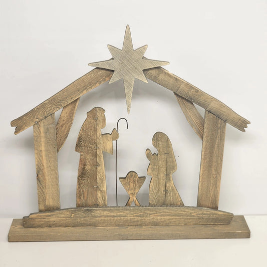 Rustic wood nativity silhouette with Joseph Mary and baby Jesus