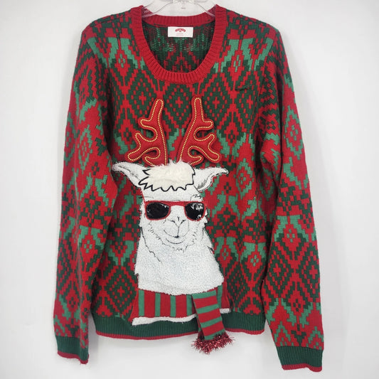 Red and green Holiday Time Christmas sweater with a 3D llama, sunglasses, antlers, and scarf.