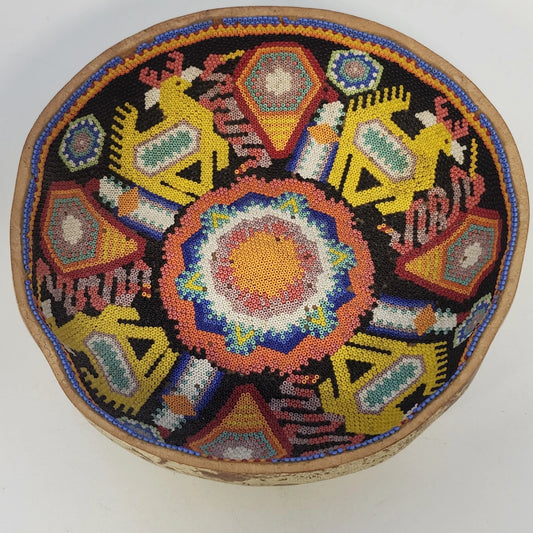 Huichol Wixárika beaded gourd bowl with colorful animal and geometric designs