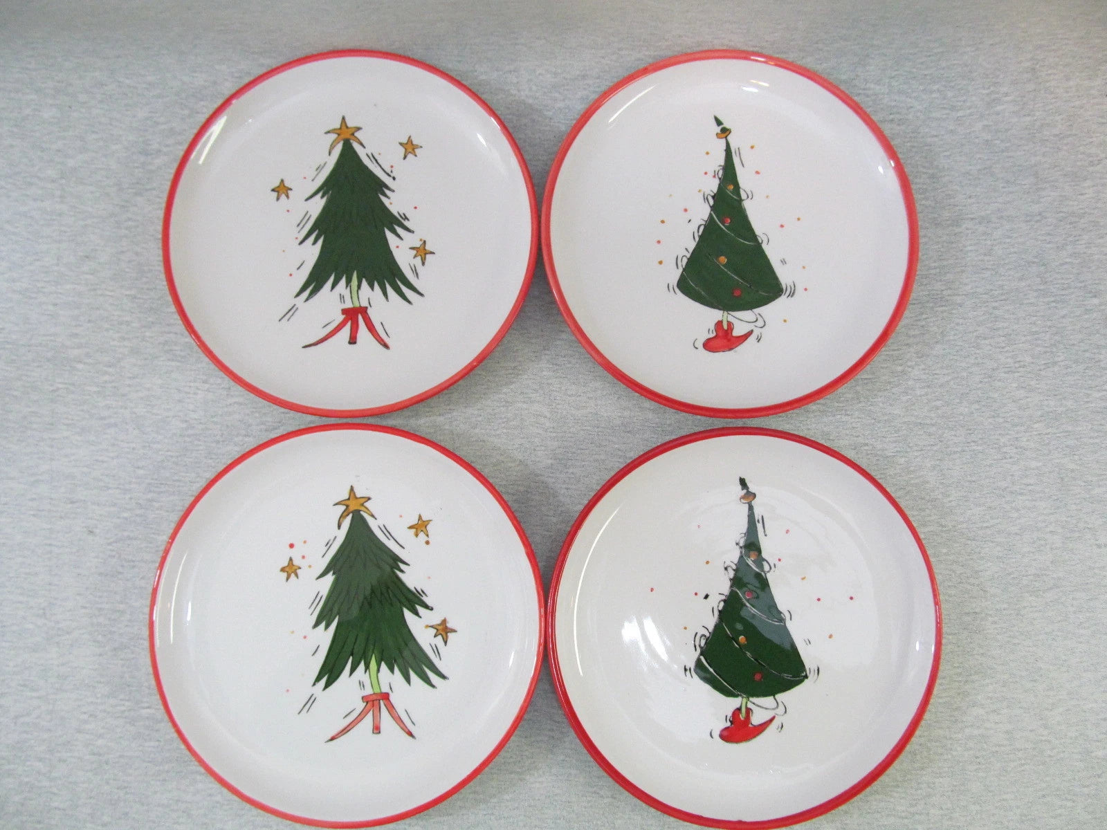 Set of four International Silver Christmas tree dessert plates with red trim