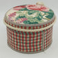 Jan Sevadjian floral striped fabric hat box with cord trim