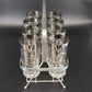 Vintage Kimiko highball glasses with silver knight shield design and carrier
