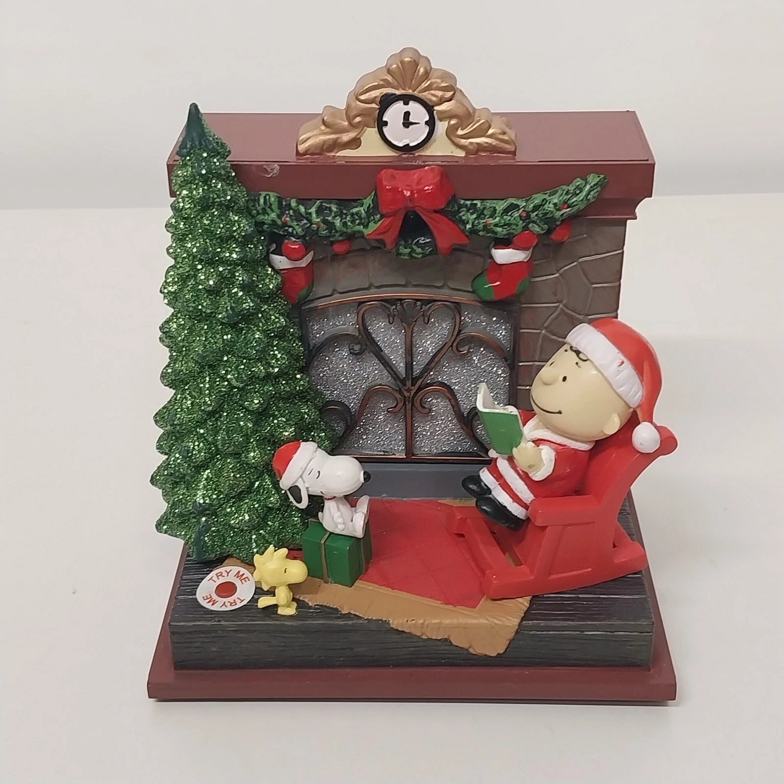 Kurt Adler Peanuts Christmas decoration with Charlie Brown and Snoopy by a fireplace