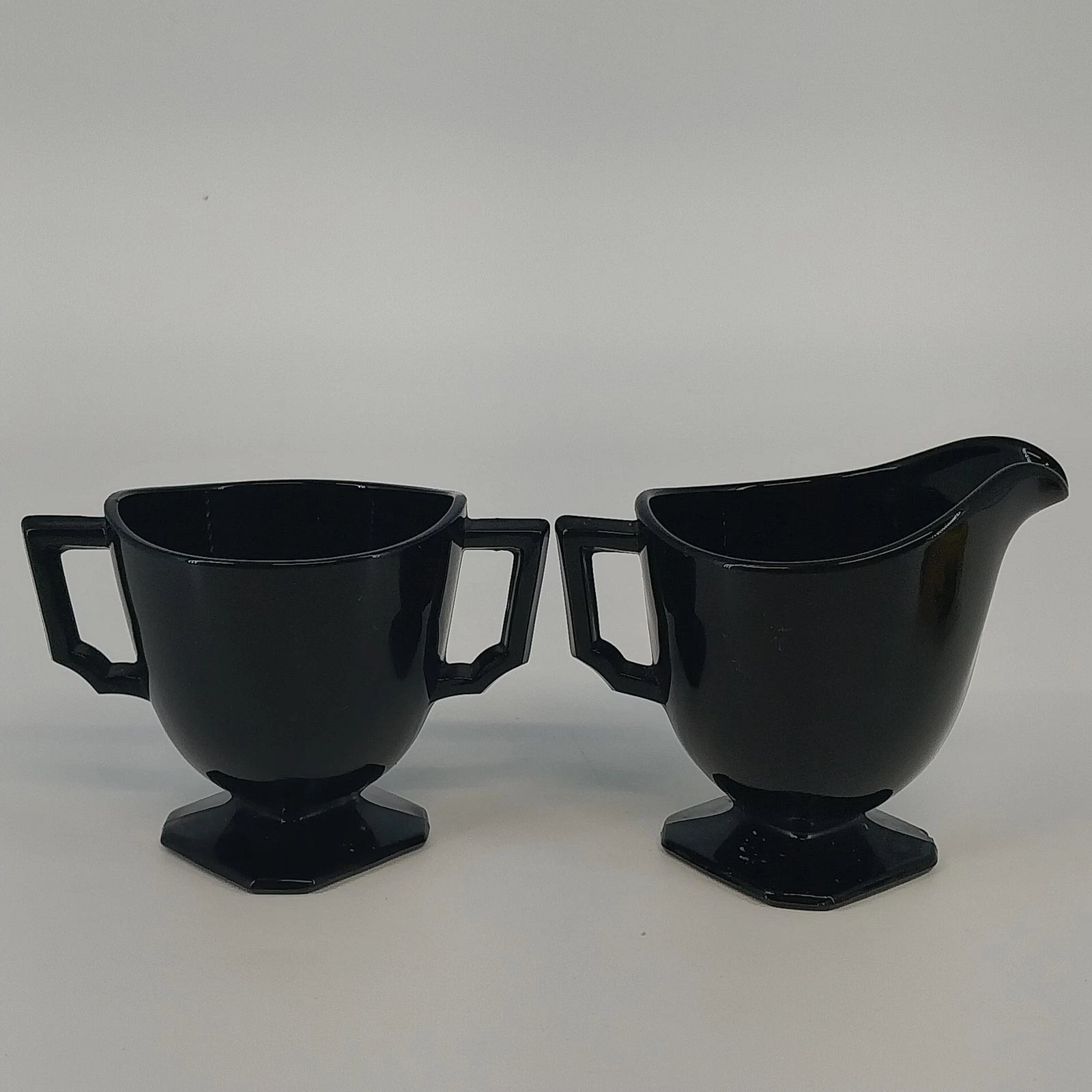 LE Smith black glass Double Shield cream and sugar set