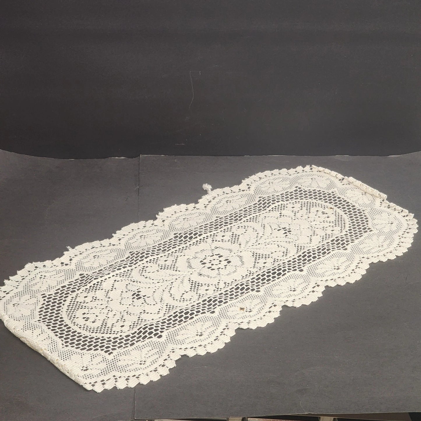 Oval off white lace table runner with floral crochet pattern