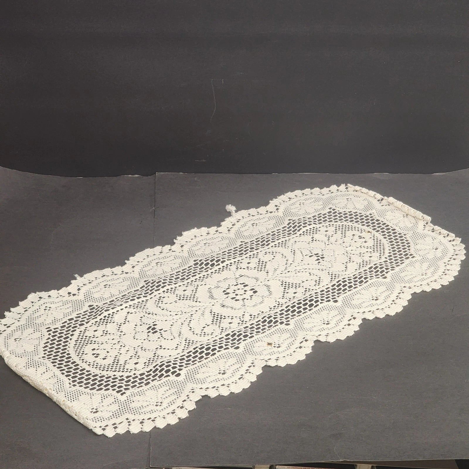 Oval off white lace table runner with floral crochet pattern