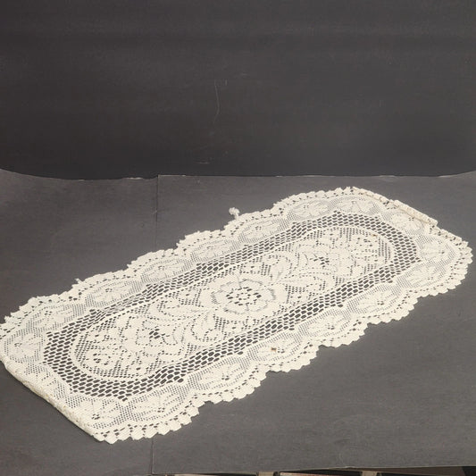 Oval off white lace table runner with floral crochet pattern