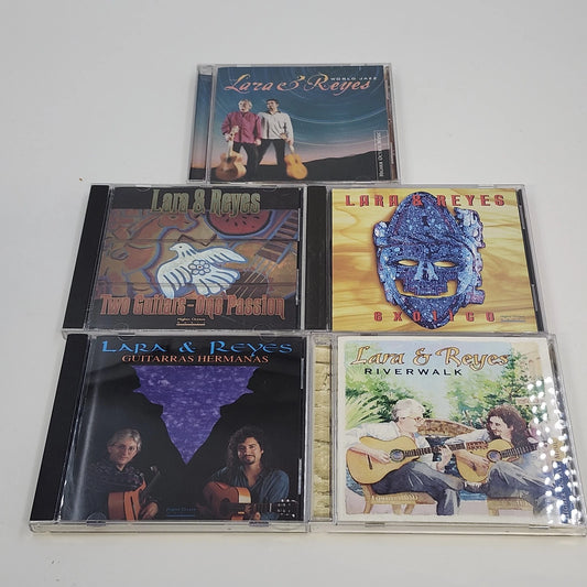 Lara & Reyes five-CD music collection featuring World Jazz, Two Guitars - One Passion, Exótico, Guitarras Hermanas, and Riverwalk albums in original jewel cases.