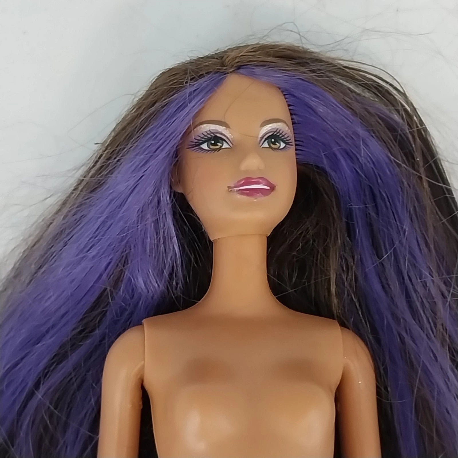Mattel Barbie ballerina doll with brunette hair and purple highlights