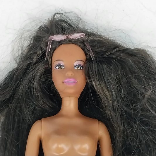 Mattel Barbie fashion doll with black hair and pink lips
