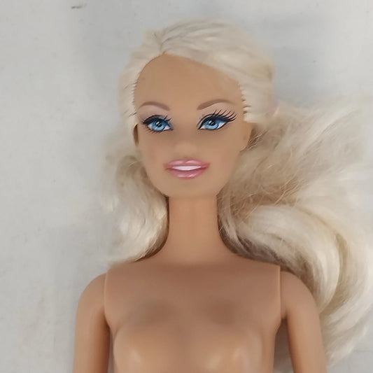 Mattel Barbie doll with light blonde ponytail and bendable knees
