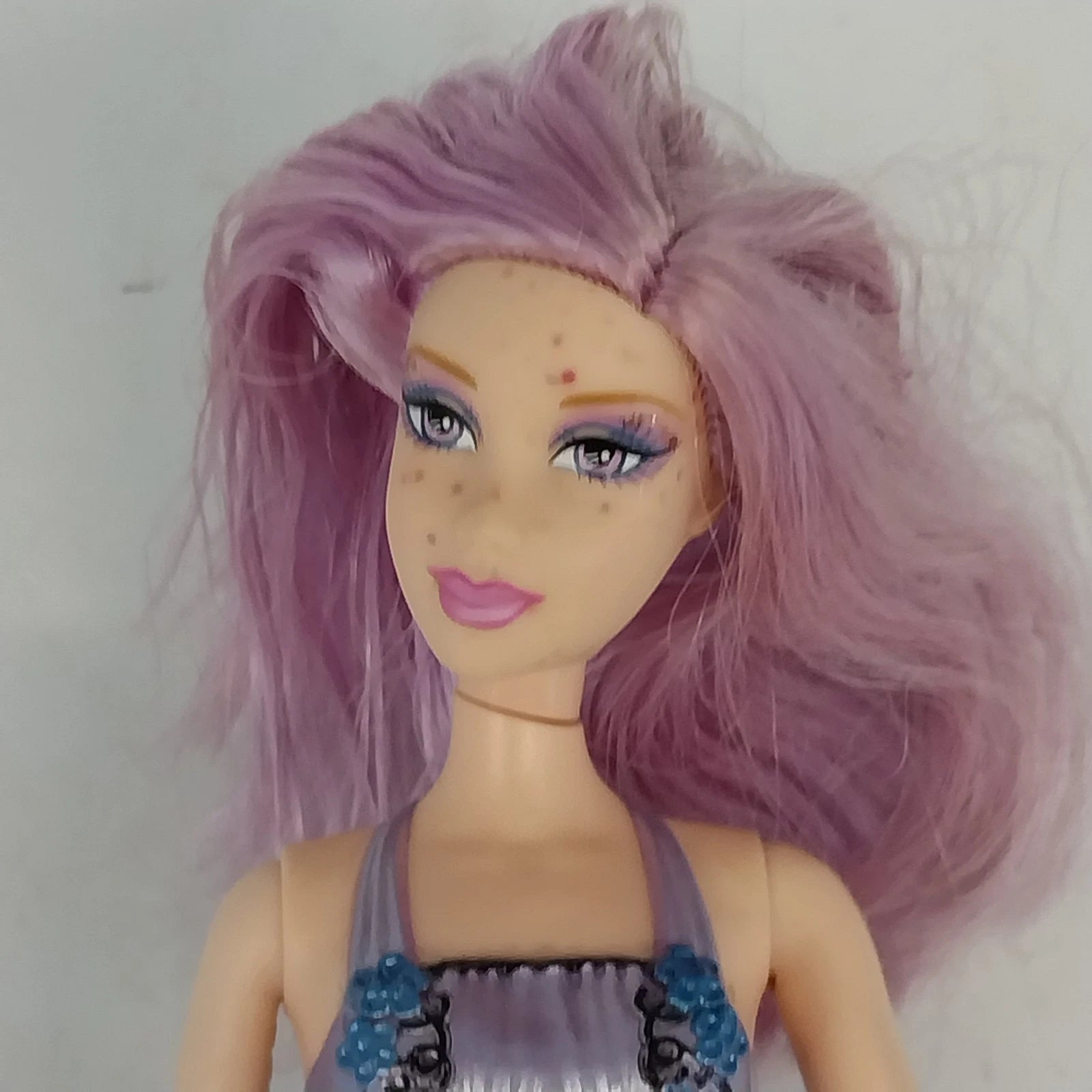 Mattel Barbie Mariposa Willa fairy doll with lavender butterfly themed design