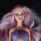 Mattel Barbie mermaid doll with purple hair and glitter top