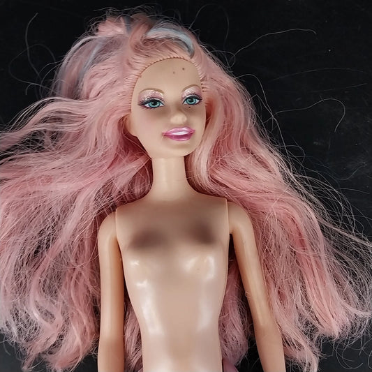 Mattel Barbie mermaid doll with pink hair and blue eyes