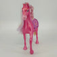 Pink Disney Princess horse toy with blonde mane and purple saddle