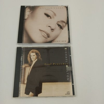 Two classic CDs featuring Michael Bolton Soul Provider and Mariah Carey Music Box