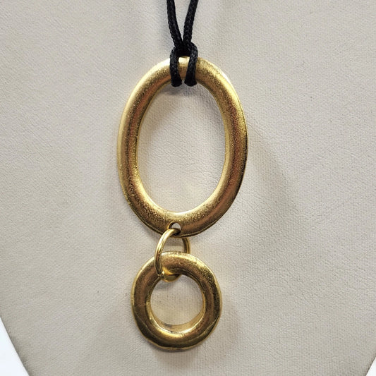 Gold-tone modernist double hoop pendant necklace with organic oval shapes and black cord