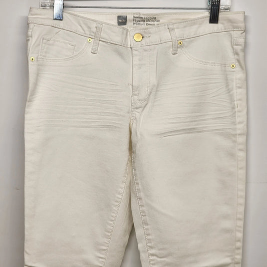 Mossimo women's white stretch denim jeans size 10 with zipper hem