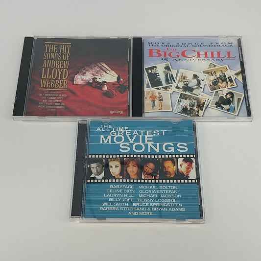 Lot of 3 soundtrack CDs featuring The Big Chill, movie songs, and Andrew Lloyd Webber hits