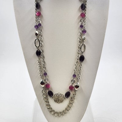 Silver tone double strand necklace with multicolor beads and filigree accents