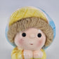 Vintage little boy ceramic planter with spaghetti yarn hair and blue bow