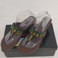 Brown Newport News thong slide sandals with rhinestone embellishments