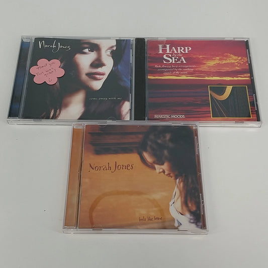 Lot of 3 CDs featuring Norah Jones albums and Harp by the Sea instrumental music