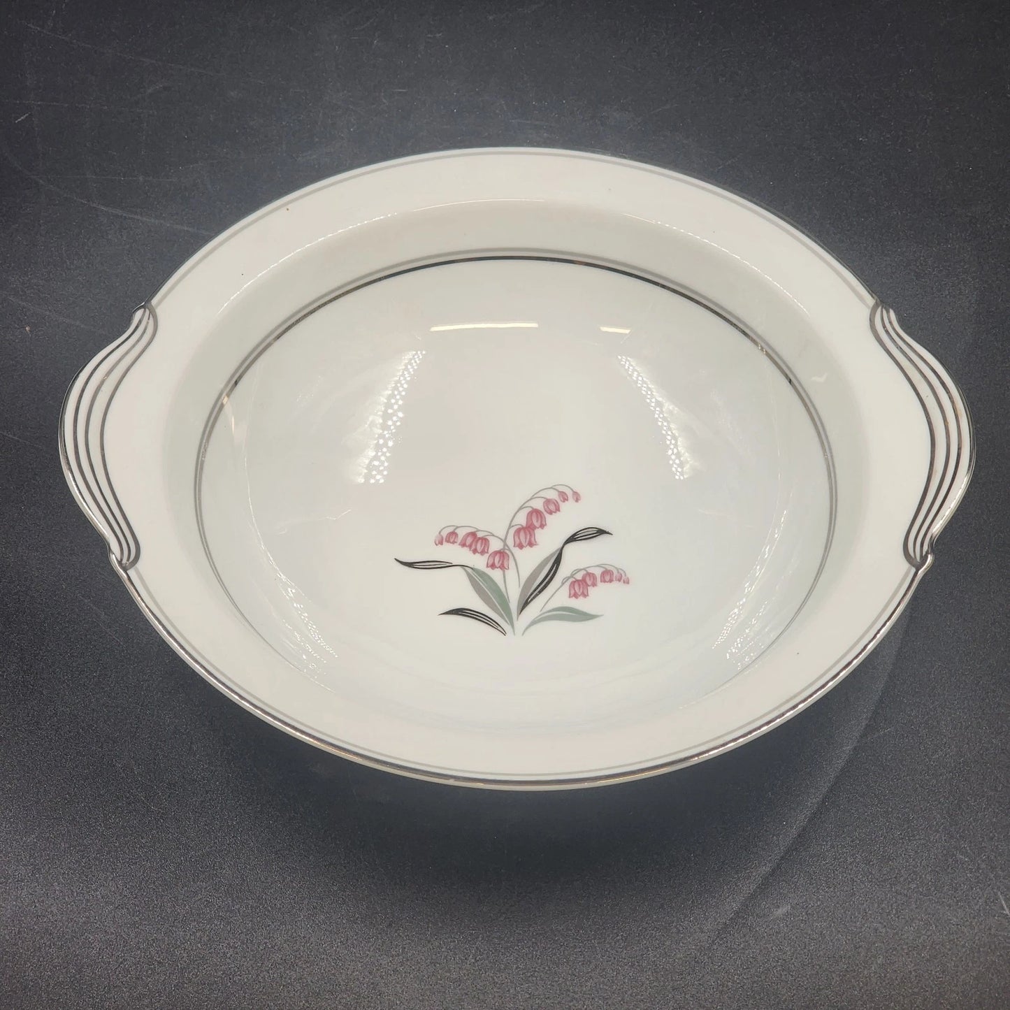 Noritake Crest 5421 round vegetable bowl with Lily of the Valley and platinum trim