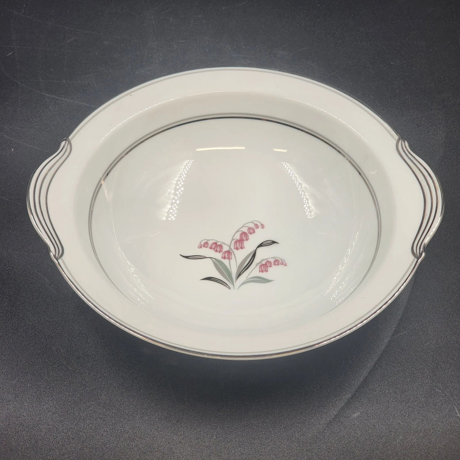 Noritake Crest 5421 round vegetable bowl with Lily of the Valley and platinum trim