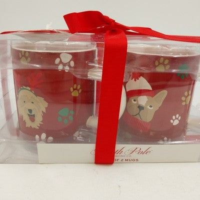 Set of two red North Pole Trading Co Christmas mugs with dog and paw print