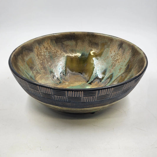 Ochre green glazed pottery bowl with basket weave textured rim