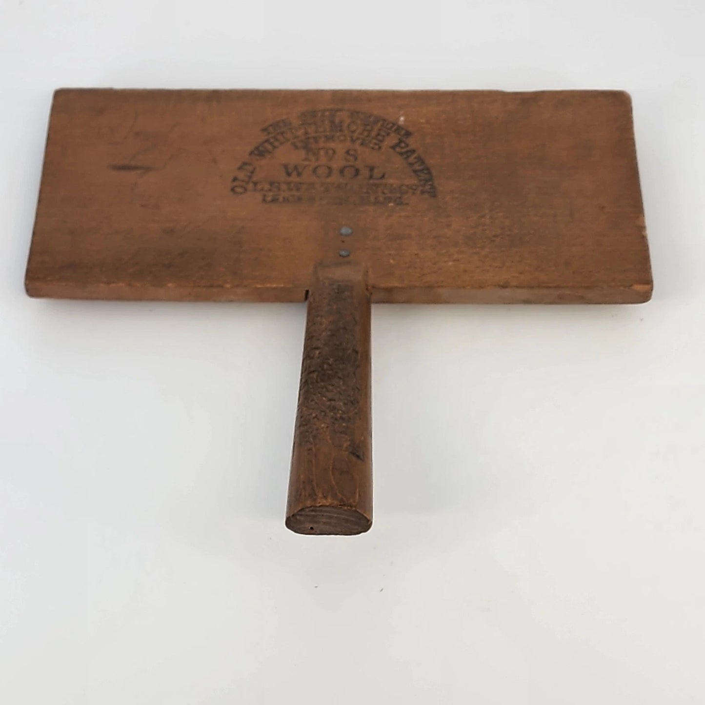 Antique Old Whittemore wool carder with wood handle and metal teeth