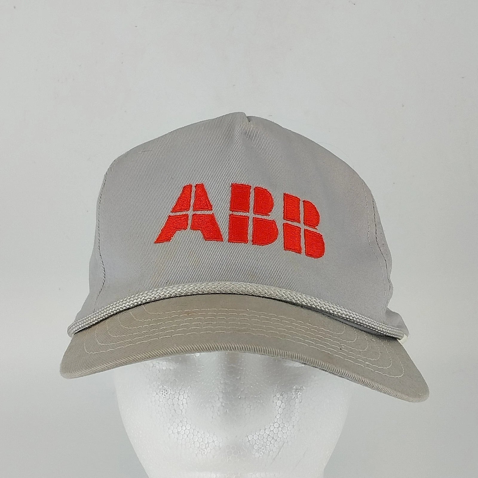 Gray Paramount baseball cap with embroidered ABB logo and leather buckle strap