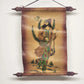 Decorative scroll with a painted figure on a brown background