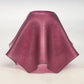 Pink glass shade on a white background