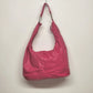 Pink leather hobo shoulder bag with silver studs slouchy design