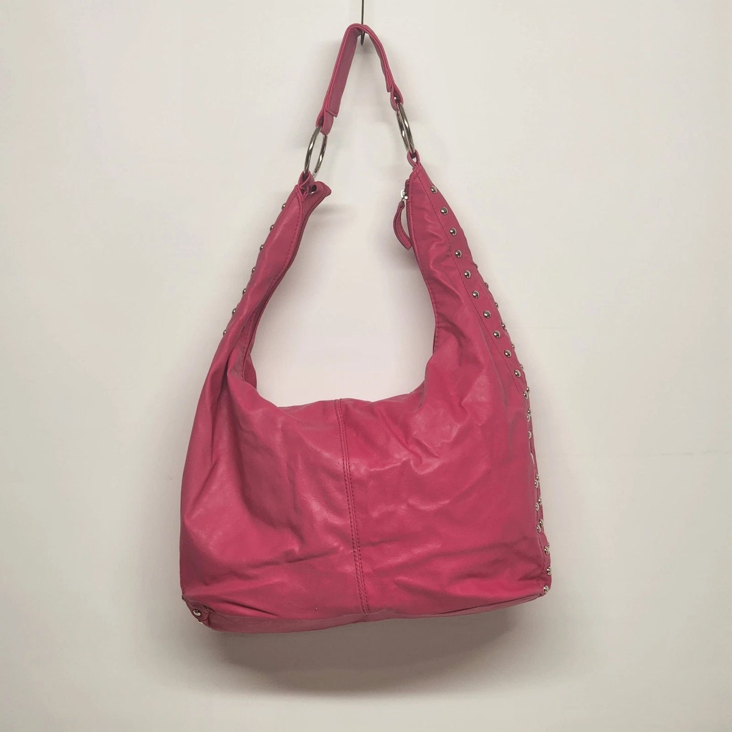 Pink leather hobo shoulder bag with silver studs slouchy design