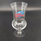 Planet Hollywood Orlando 16 oz hurricane glass with red and blue logo
