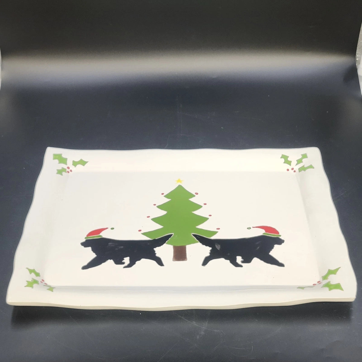 Vintage ceramic Christmas platter with two black dogs in Santa hats