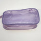 Compact translucent purple cosmetic bag with zipper closure and wrist strap.