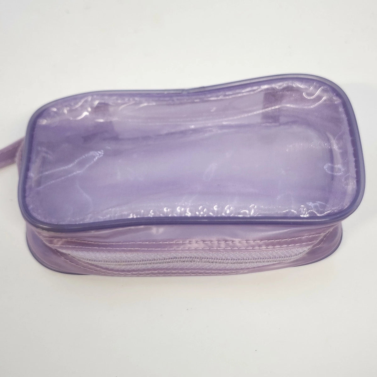 Compact translucent purple cosmetic bag with zipper closure and wrist strap.