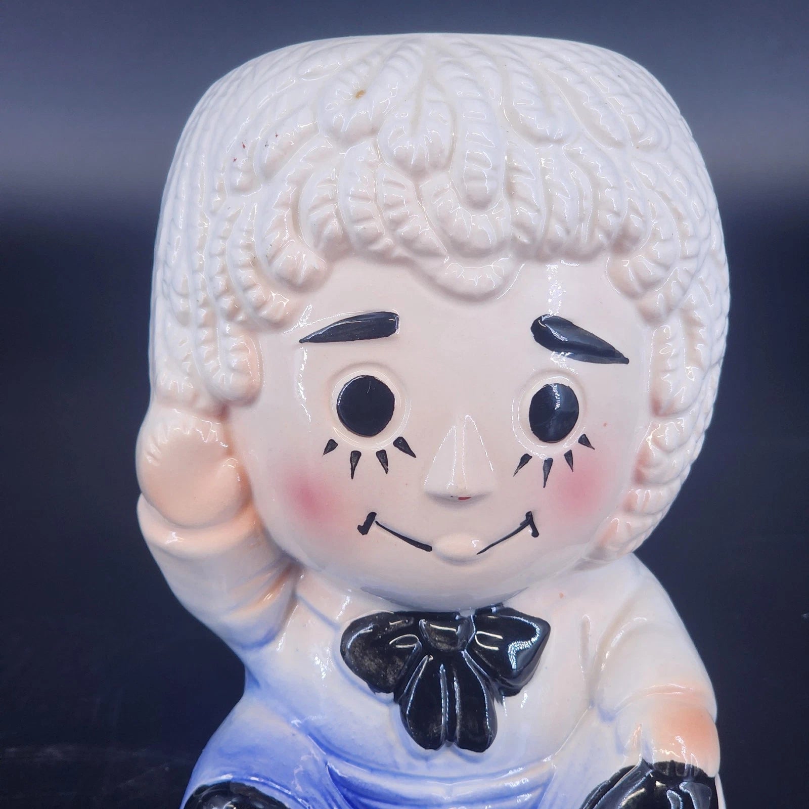 Vintage Raggedy Andy ceramic planter figurine with hand painted details