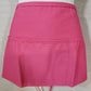 Pink apron on a neutral background
