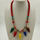 Christmas necklace with red green wood beads and multicolor light pendants